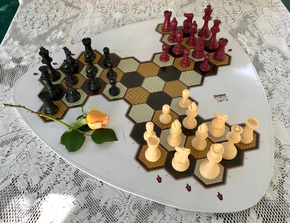Photo of Hexes 3-Pawn chess for three players.
